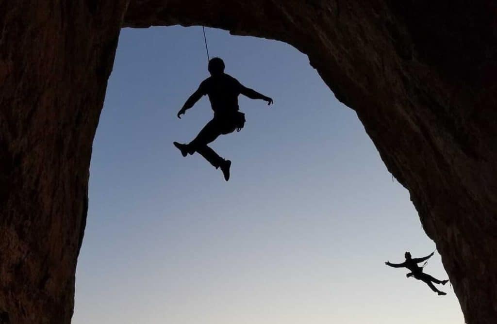 R ock climbers at the bat cave in sierra county new mexico.