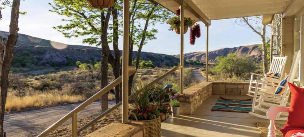 front porch country house at ladder ranch